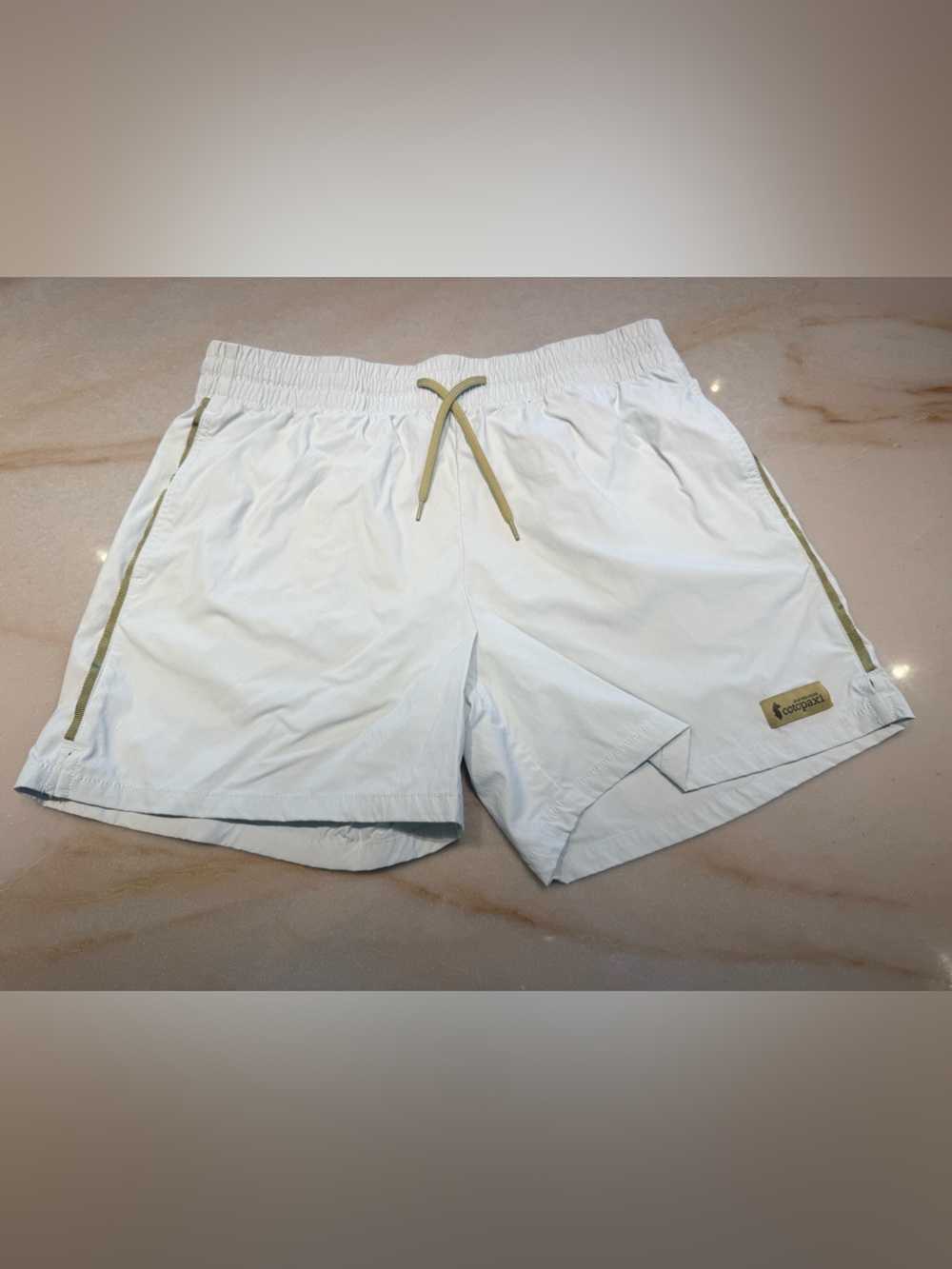 cotopaxi Pale Green Athletic Shorts with Green Trim